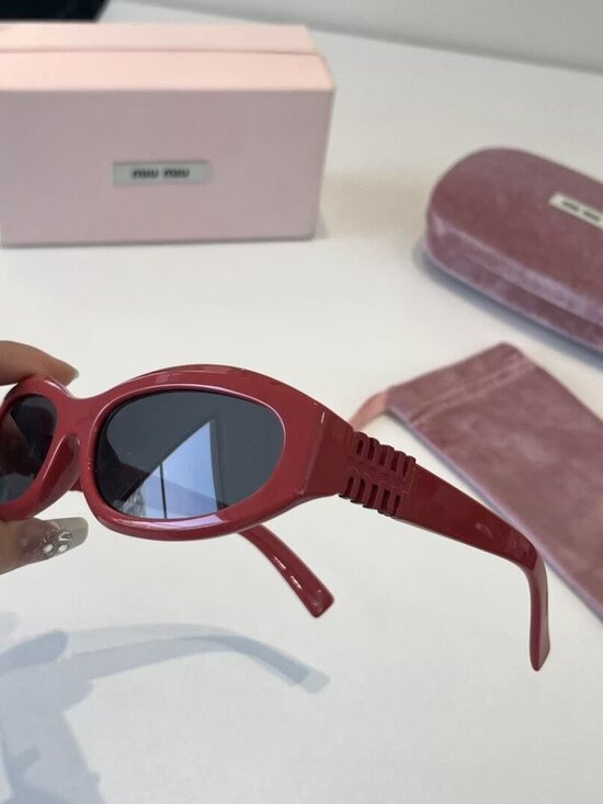 Miu Miu Red Oval Sunglasses with Dark Lonses